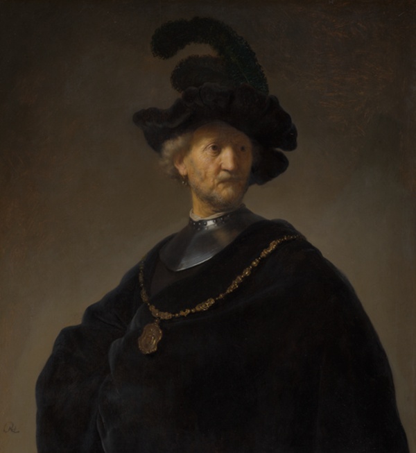 Portrait of man wearing voluminous black cloak, feathered hat, and gold medallion.