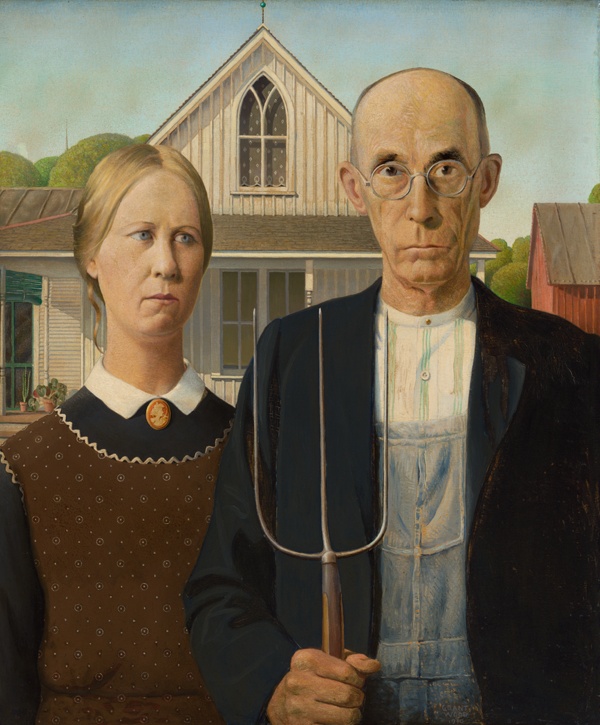 Painting of a woman and an older white man holding a pitchfork, both seen from the waist up. They stand side by side with stern expressions, in front of a white house with a peaked roof.
